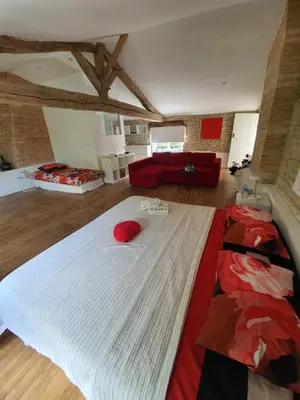 Un ou plusieurs lits dans un hébergement de l'établissement Maison Laurenza La grande suite 1760