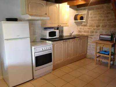 Cuisine ou kitchenette dans l'établissement Columba - Les Constellations
