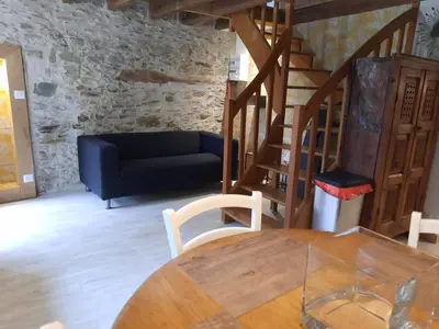 Coin salon dans l'établissement Gîte du Petit Moulin