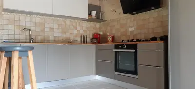 Cuisine ou kitchenette dans l'établissement Moulin de Ringère