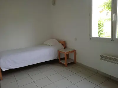 Un ou plusieurs lits dans un hébergement de l'établissement Olydea le Lambon - Prailles-la-Couarde