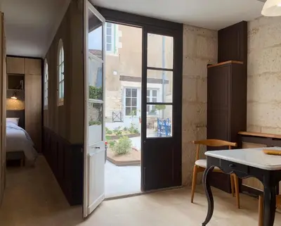 Un ou plusieurs lits dans un hébergement de l'établissement Appartement Escapade Marine - Maison d Aligre