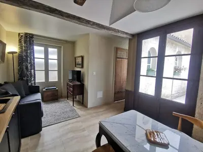Coin salon dans l'établissement Appartement Escapade Marine - Maison d Aligre