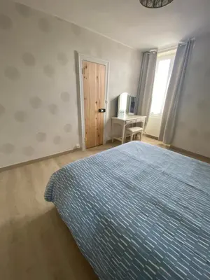 Un ou plusieurs lits dans un hébergement de l'établissement Numéro 96 chambre d hôtes