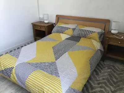 Un ou plusieurs lits dans un hébergement de l'établissement Numéro 96 chambre d hôtes