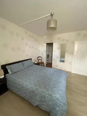 Un ou plusieurs lits dans un hébergement de l'établissement Numéro 96 chambre d hôtes