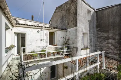 Balcon ou terrasse dans l'établissement Les Volets Bleus T3 de 80 m2 patio privatif