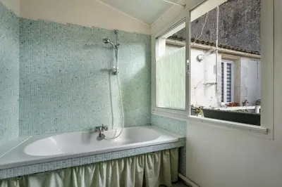 Salle de bains dans l'établissement Les Volets Bleus T3 de 80 m2 patio privatif
