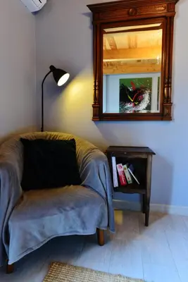 Coin salon dans l'établissement Chez Pique-Fesse Chambre d'hote