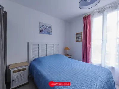 Un ou plusieurs lits dans un hébergement de l'établissement Échoppe confortable à 200m de la plage - 4 pers, patio, cuisine équipée - FR-1-258-198