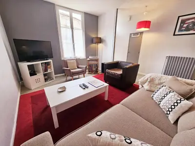 Coin salon dans l'établissement Maison de ville confortable avec cour intérieure