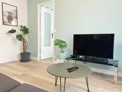 Télévision ou salle de divertissement dans l'établissement T2 Moderne au Cœur Poitiers