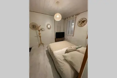 Un ou plusieurs lits dans un hébergement de l'établissement Le Cocoon - 2mn gare SNCF, hyper centre, WIFI-NETFLIX