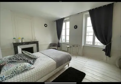 Un ou plusieurs lits dans un hébergement de l'établissement Appartement plein centre de la ROCHELLE