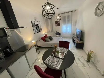 Coin salon dans l'établissement Le Dolce Vita - Centre historique, proche toutes commodités, stationnement aisé, Wifi-Netflix