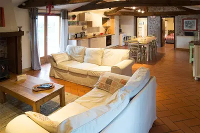 Coin salon dans l'établissement Gîte de La Pomerie
