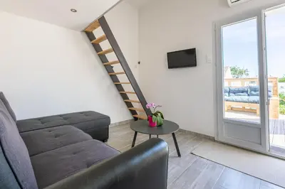Télévision ou salle de divertissement dans l'établissement Cosy Corner