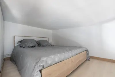 Un ou plusieurs lits dans un hébergement de l'établissement Cosy Corner