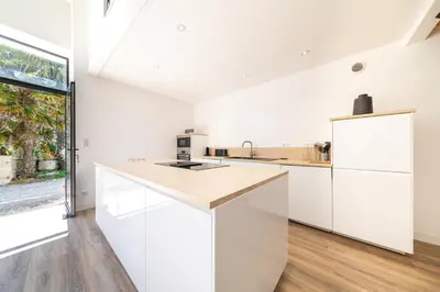 Cuisine ou kitchenette dans l'établissement Les Jardins de Xanton