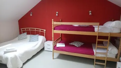 Un ou plusieurs lits dans un hébergement de l'établissement Auberge des lacs
