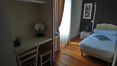 Un ou plusieurs lits dans un hébergement de l'établissement Auberge des lacs
