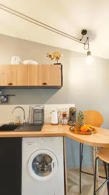 Cuisine ou kitchenette dans l'établissement Votre Escale - Calliopé