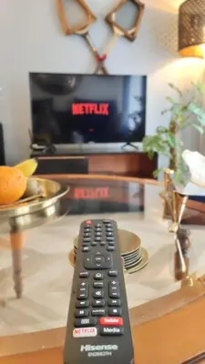 Télévision ou salle de divertissement dans l'établissement Votre Escale - Calliopé
