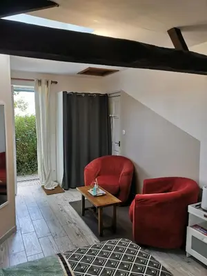 Coin salon dans l'établissement La Chambre de La Pomerie