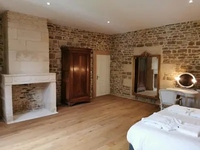 Un ou plusieurs lits dans un hébergement de l'établissement La Maison des mariés - Nature & Sèvre Niortaise