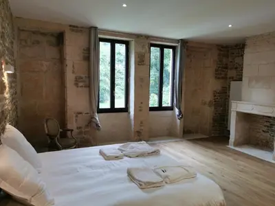 Un ou plusieurs lits dans un hébergement de l'établissement La Maison des mariés - Nature & Sèvre Niortaise
