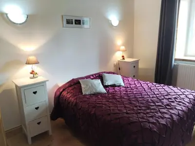 Un ou plusieurs lits dans un hébergement de l'établissement La Maison près du ruisseau