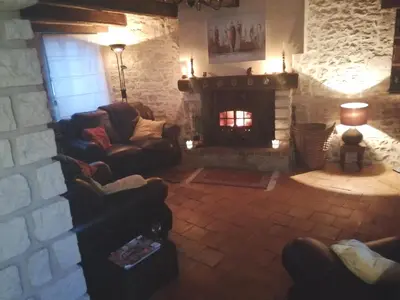Coin salon dans l'établissement Les Granges de la Leigne, Ruffec
