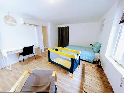 Un ou plusieurs lits dans un hébergement de l'établissement Maison et Appartements d'Anatole France proche Centre-Ville, Université - CHU, Patinoire et Futuroscope