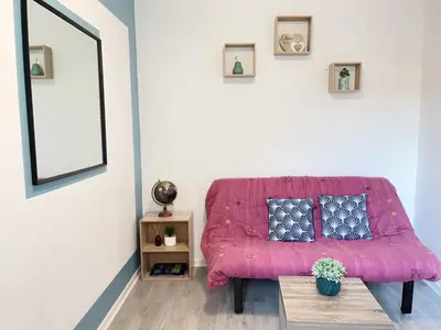 Coin salon dans l'établissement Jolie appartement 2 chambres 65m2 au centre ville