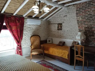 Coin salon dans l'établissement L'Ecrin des Roches