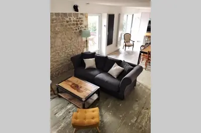 Coin salon dans l'établissement Maison proche centre ville