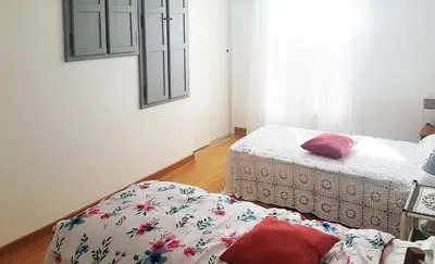 Un ou plusieurs lits dans un hébergement de l'établissement maison calme et paisible