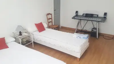 Un ou plusieurs lits dans un hébergement de l'établissement maison calme et paisible
