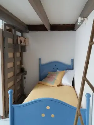 Un ou plusieurs lits dans un hébergement de l'établissement Chambre d'hôtes La Thibaudière