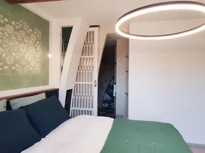 Un ou plusieurs lits dans un hébergement de l'établissement Gîte d'Architecte 6 Pers. avec Terrasse et Jardin à Pissotte - FR-1-426-480