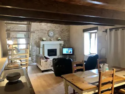 Télévision ou salle de divertissement dans l'établissement Les Roches