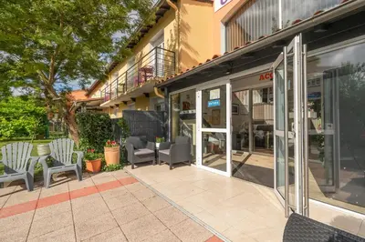 Balcon ou terrasse dans l'établissement Contact Hôtel O'Nice Saintes