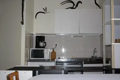 Cuisine ou kitchenette dans l'établissement Appartement champêtre - Déconnexion assurée