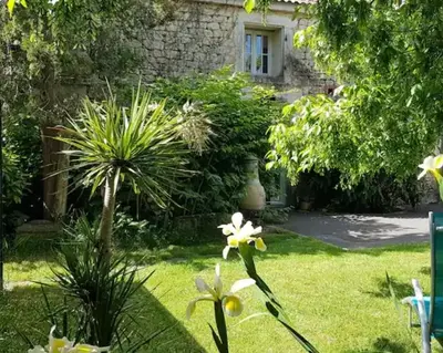 Jardin de l'établissement Charmante maison de campagne