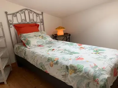 Un ou plusieurs lits dans un hébergement de l'établissement Gite du Logis de la Roche - Niort - Chauray