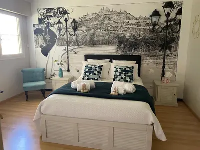 Un ou plusieurs lits dans un hébergement de l'établissement Le Maine N 5 FLEAC - Logement entier avec 3 suites SDB - Balcon