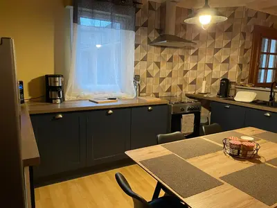 Cuisine ou kitchenette dans l'établissement Le Maine N 5 FLEAC - Logement entier avec 3 suites SDB - Balcon