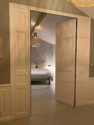 Un ou plusieurs lits dans un hébergement de l'établissement Le Lodge du Chêne