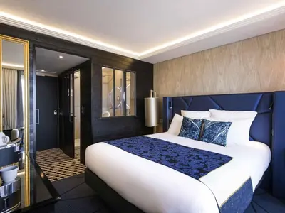 Un ou plusieurs lits dans un hébergement de l'établissement La Grande Terrasse Hotel & Spa La Rochelle - MGallery Collection