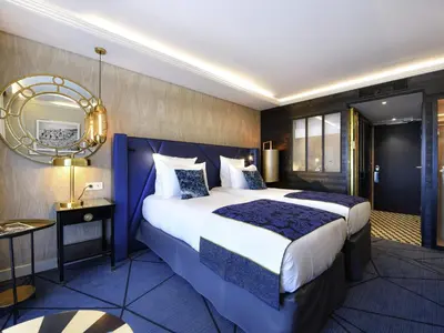 Un ou plusieurs lits dans un hébergement de l'établissement La Grande Terrasse Hotel & Spa La Rochelle - MGallery Collection